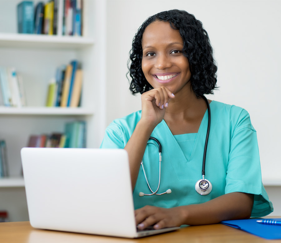 Nurse Studying with Laptop